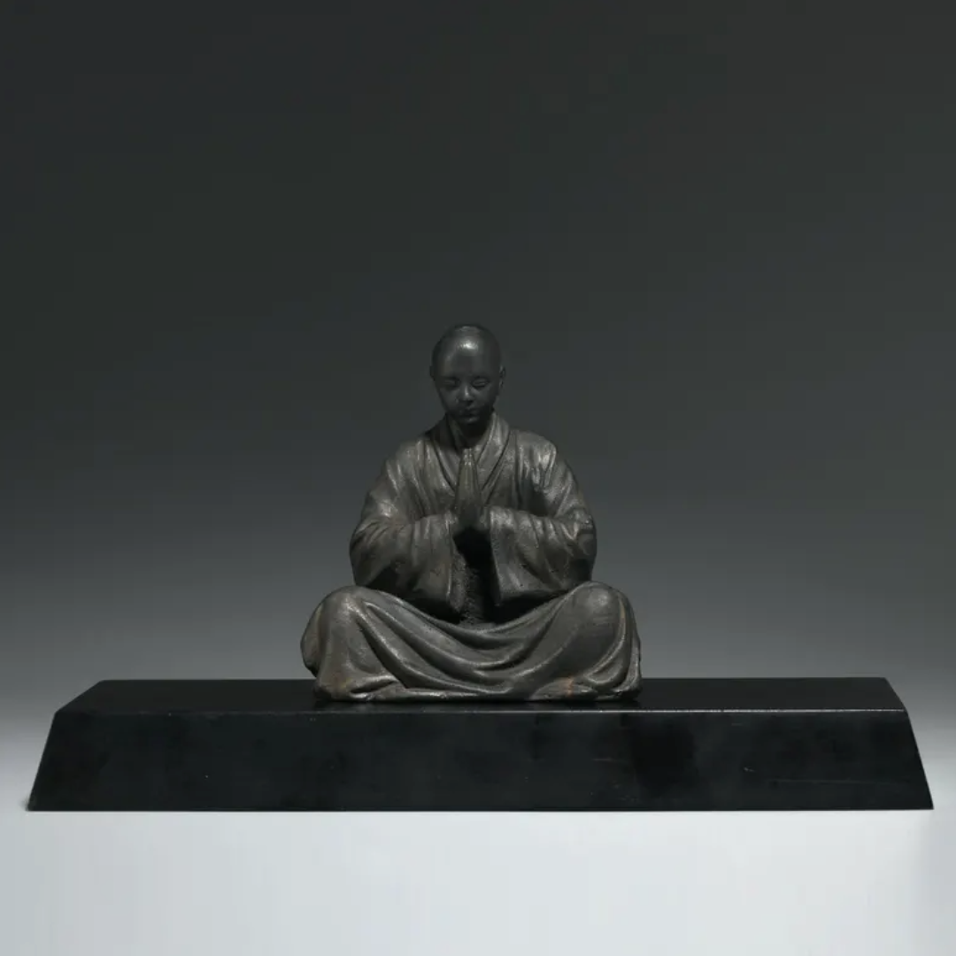 Sitting Buddhist Monk