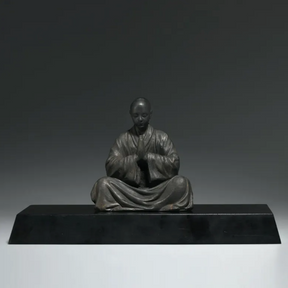 Sitting Buddhist Monk